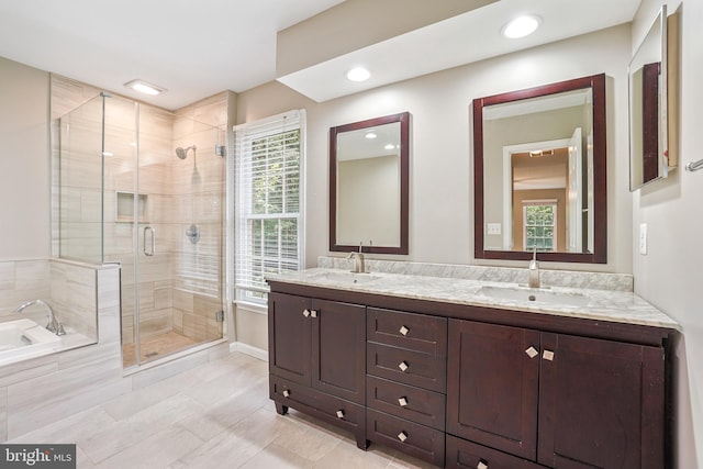 7 Somerset Ct, Annapolis, MD 21403 - bathroom featuring a stall shower, a garden tub, double vanity, tile patterned floors, and recessed lighting