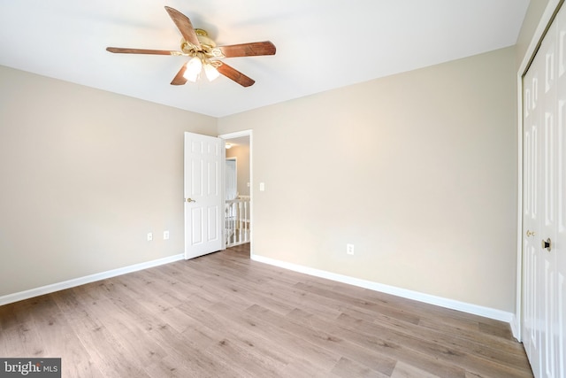7 Somerset Ct, Annapolis, MD 21403 - unfurnished bedroom with a closet, light wood-type flooring, and a ceiling fan