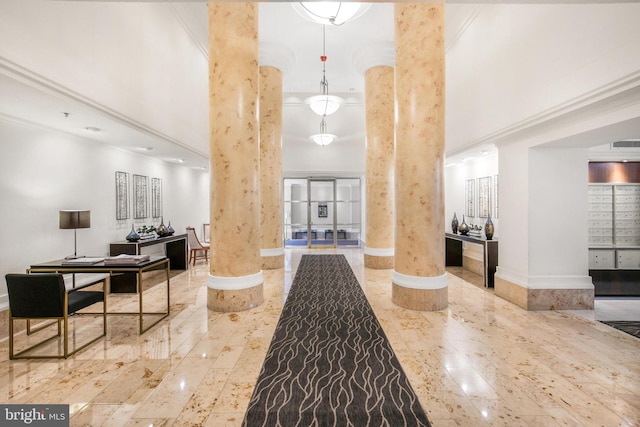 2121 Jamieson Ave Unit 707, Alexandria, VA 22314 - building lobby featuring ornamental molding and a towering ceiling