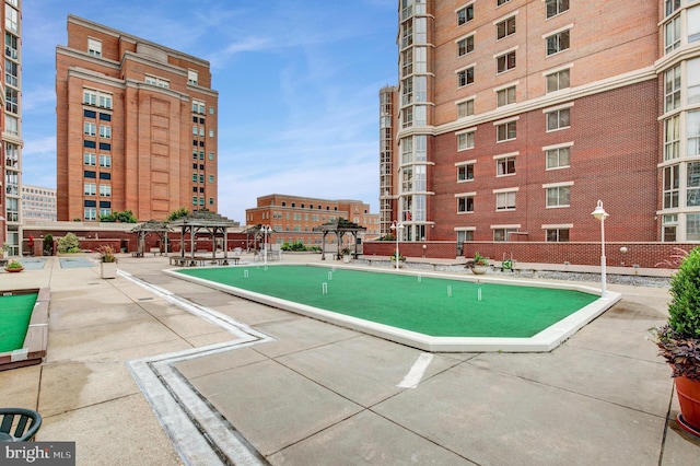 2121 Jamieson Ave Unit 707, Alexandria, VA 22314 - view of swimming pool featuring a putting green