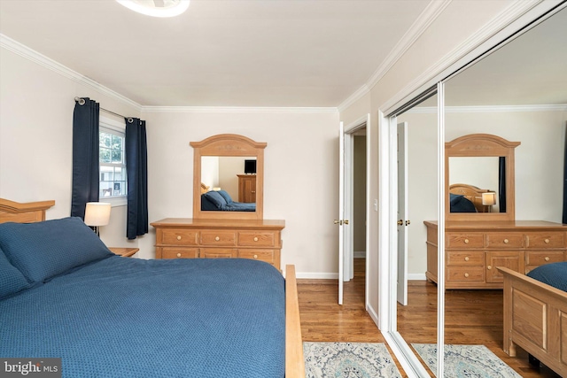 5 Wisteria Ln, Hamilton, NJ 08690 - bedroom featuring light wood-type flooring, ornamental molding, and a closet