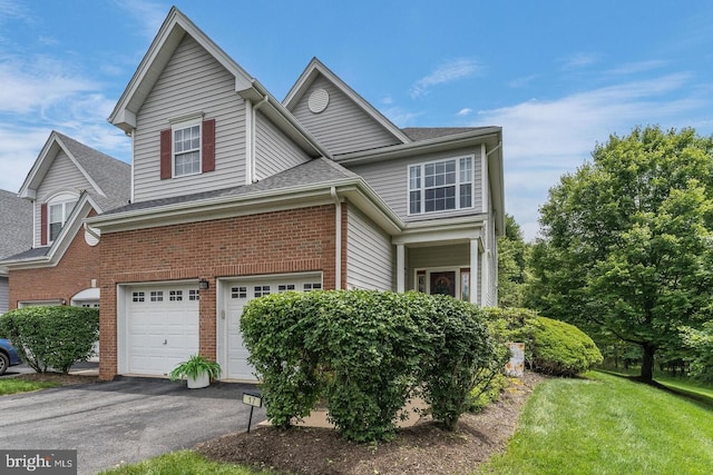 17 Paddock Ln, Flemington, NJ 08822 - traditional-style home with an attached garage, asphalt driveway, brick siding, a front lawn, and a shingled roof