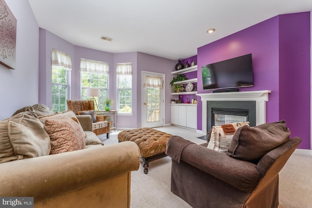 17 Paddock Ln, Flemington, NJ 08822 - living area featuring light carpet, a glass covered fireplace, and recessed lighting