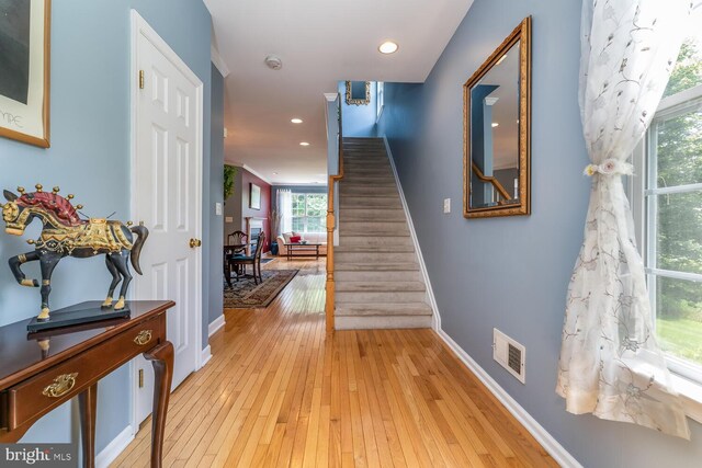 17 Paddock Ln, Flemington, NJ 08822 - hallway with stairway, light wood finished floors, and recessed lighting