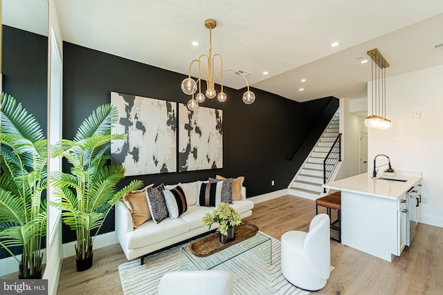 2517 Ontario Rd NW Unit Ph7, Washington, DC 20009 - living room with light wood-type flooring, stairway, and recessed lighting