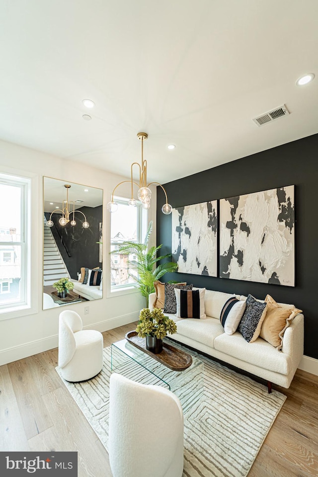 2517 Ontario Rd NW Unit Ph7, Washington, DC 20009 - living room featuring wood finished floors, recessed lighting, and a chandelier
