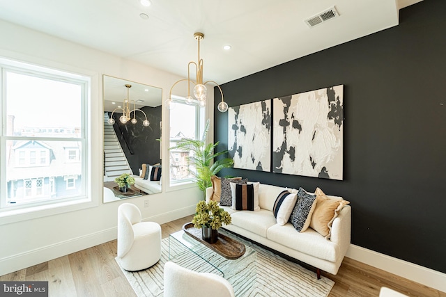 2517 Ontario Rd NW Unit Ph7, Washington, DC 20009 - living room with healthy amount of natural light, wood finished floors, a chandelier, and recessed lighting