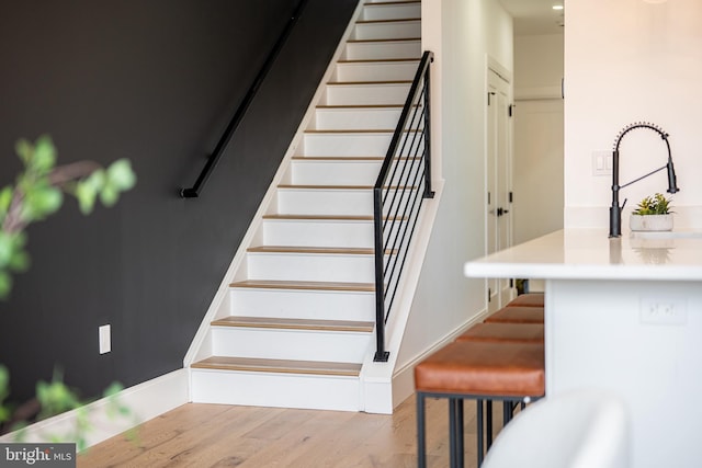 2517 Ontario Rd NW Unit Ph7, Washington, DC 20009 - stairs with wood finished floors and baseboards