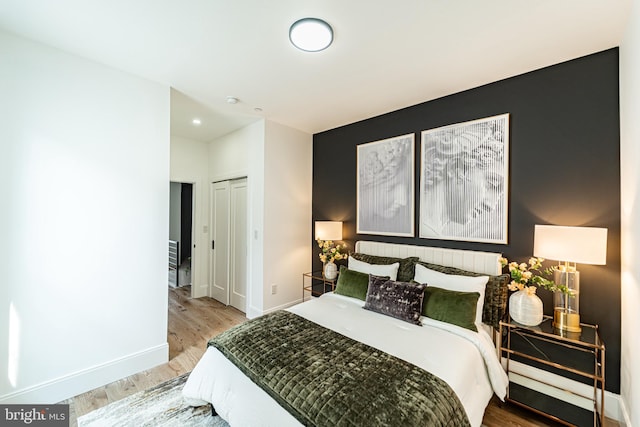 2517 Ontario Rd NW Unit Ph7, Washington, DC 20009 - bedroom featuring wood finished floors and a closet