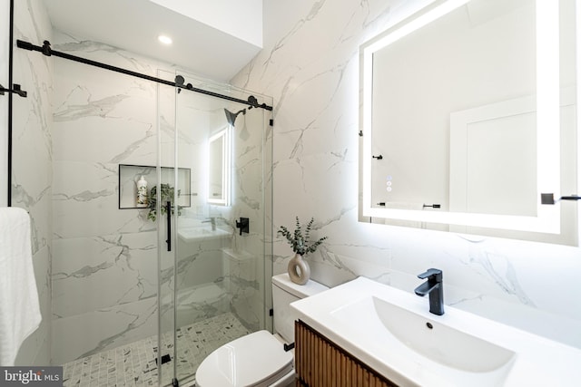2517 Ontario Rd NW Unit Ph7, Washington, DC 20009 - bathroom with tile walls, vanity, a marble finish shower, and recessed lighting