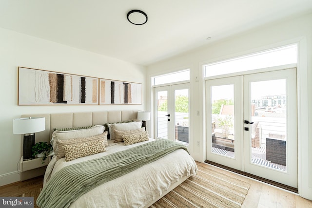 2517 Ontario Rd NW Unit Ph7, Washington, DC 20009 - bedroom featuring french doors, access to outside, and wood finished floors