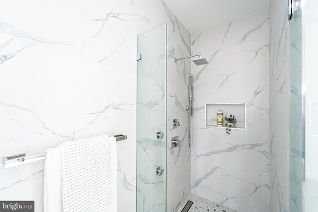 2517 Ontario Rd NW Unit Ph7, Washington, DC 20009 - bathroom with a marble finish shower
