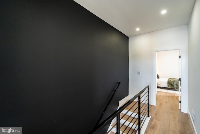 2517 Ontario Rd NW Unit Ph7, Washington, DC 20009 - hall with an upstairs landing, recessed lighting, and light wood-type flooring