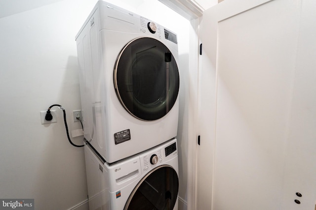 2517 Ontario Rd NW Unit Ph7, Washington, DC 20009 - washroom with stacked washer / dryer