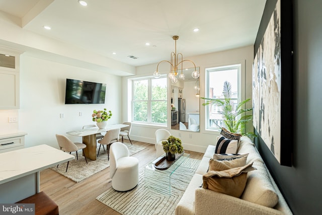 2517 Ontario Rd NW Unit Ph7, Washington, DC 20009 - living area with light wood-type flooring, recessed lighting, and a chandelier