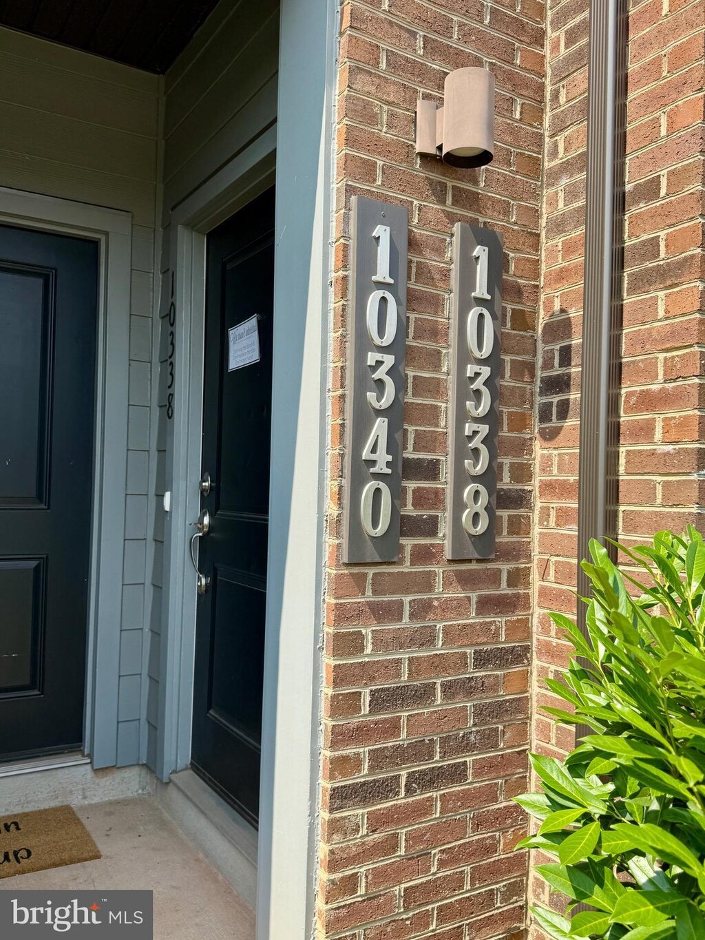 10338 Ratcliffe Trl, Manassas, VA 20110 - view of exterior entry featuring brick siding