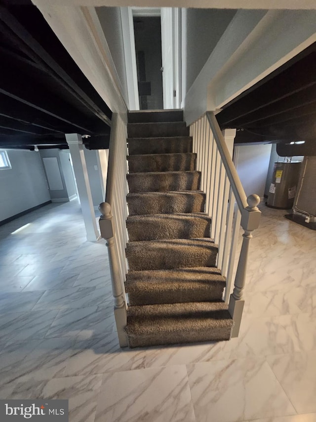 1608 Howard, Baltimore, MD 21221 - stairs featuring marble look tiles and water heater