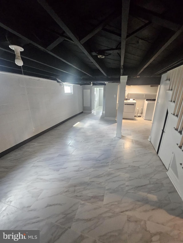 1608 Howard, Baltimore, MD 21221 - below grade area featuring stairway, washer / clothes dryer, and marble finish flooring