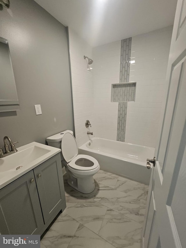 1608 Howard, Baltimore, MD 21221 - full bathroom featuring vanity, shower / bathtub combination, and marble look tiles
