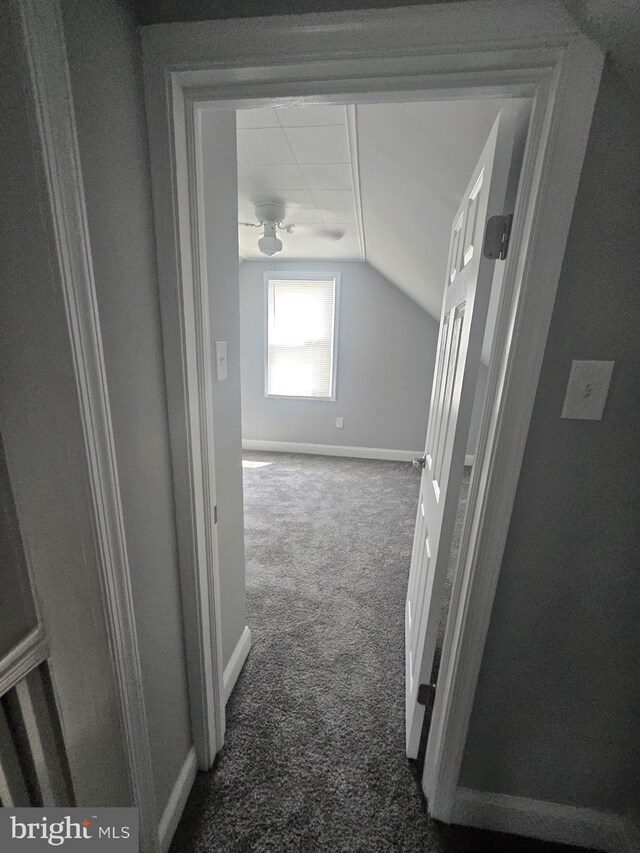 1608 Howard, Baltimore, MD 21221 - hallway featuring dark colored carpet and lofted ceiling