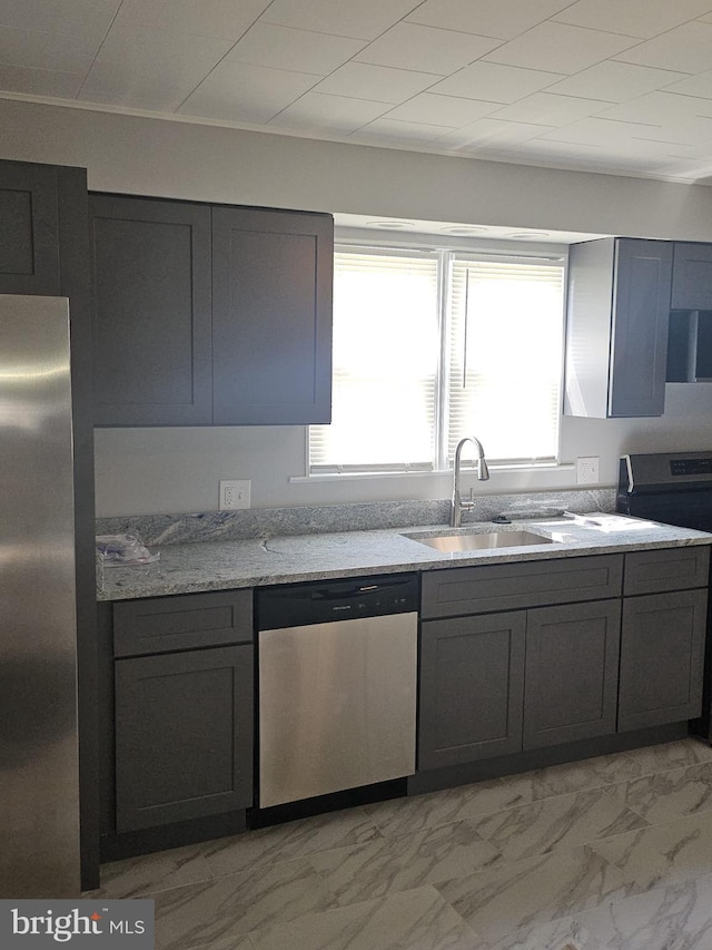 1608 Howard, Baltimore, MD 21221 - kitchen with appliances with stainless steel finishes, light marble finish floors, gray cabinets, and light stone countertops