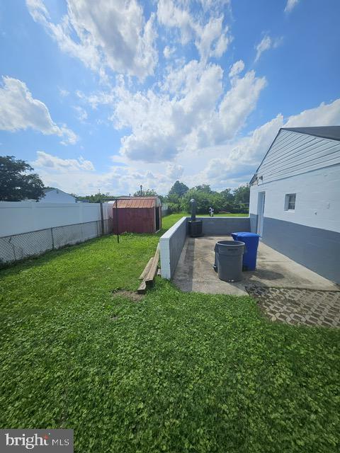1608 Howard, Baltimore, MD 21221 - view of yard featuring a shed and a patio area