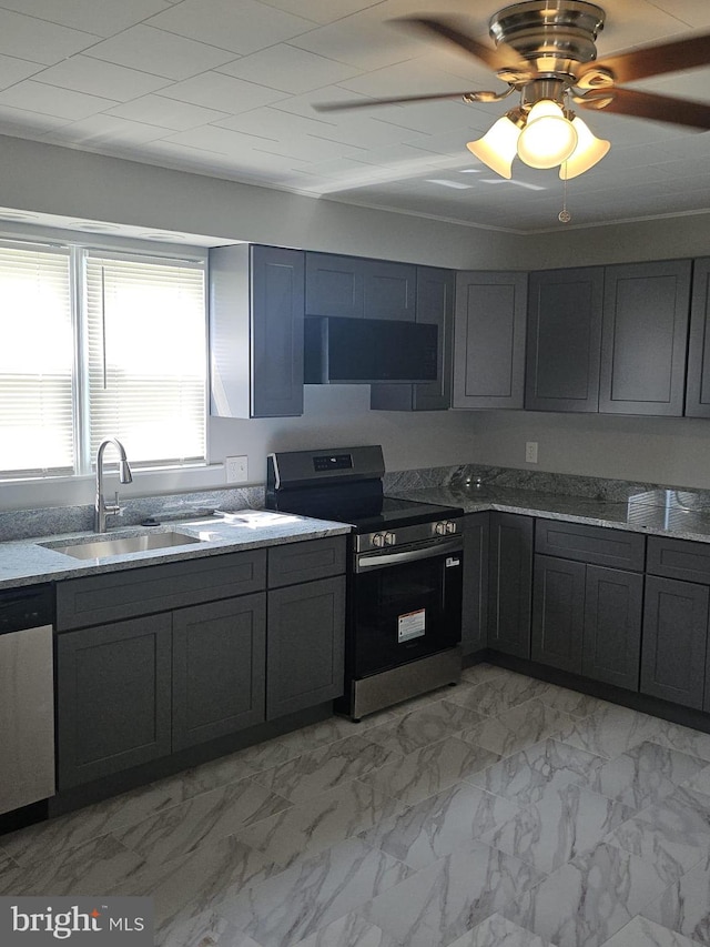 1608 Howard, Baltimore, MD 21221 - kitchen featuring appliances with stainless steel finishes, light marble finish flooring, light stone counters, a ceiling fan, and gray cabinets