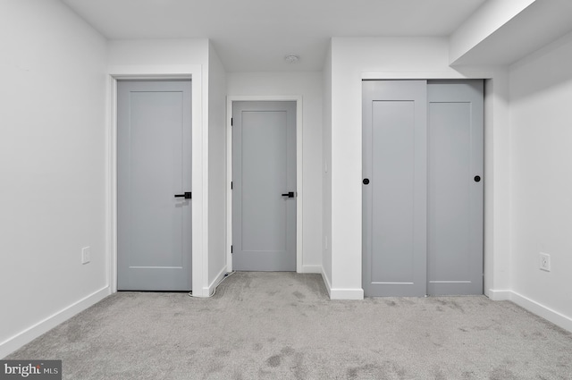 3306 E Lombard St, Baltimore, MD 21224 - unfurnished bedroom with carpet floors and a closet