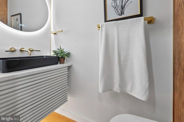 3306 E Lombard St, Baltimore, MD 21224 - half bathroom featuring toilet and a sink