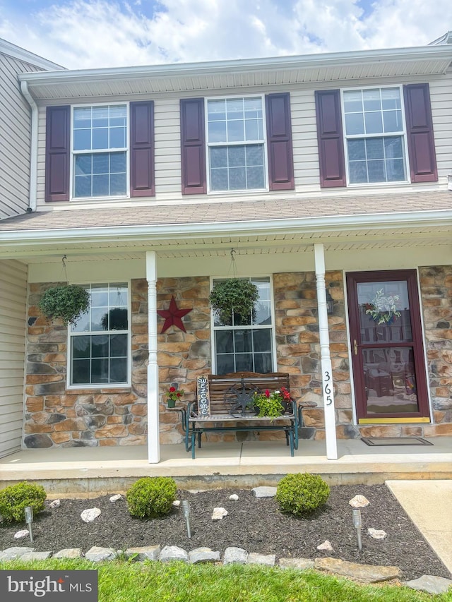 365 Charles Cir, Hellam, PA 17406 - view of front facade with a porch and stone siding