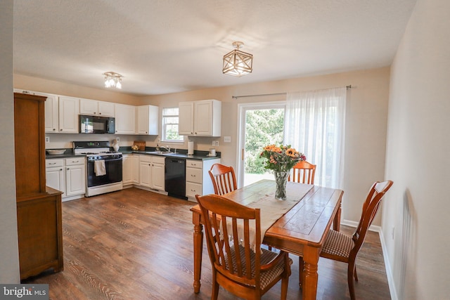 365 Charles Cir, Hellam, PA 17406 - dining area featuring dark wood finished floors