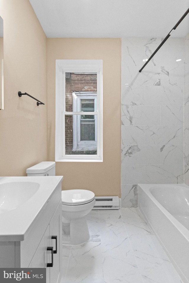 2839 N 9th St, Philadelphia, PA 19133 - bathroom with a baseboard radiator, vanity, marble finish flooring, and tub / shower combination