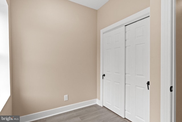 2839 N 9th St, Philadelphia, PA 19133 - unfurnished bedroom featuring wood finished floors and a closet