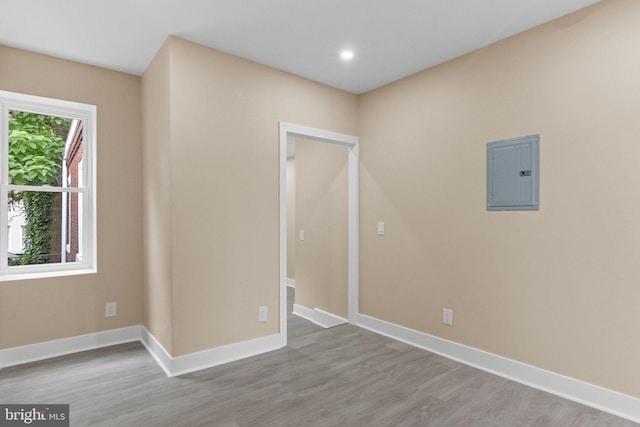 2839 N 9th St, Philadelphia, PA 19133 - empty room with electric panel, wood finished floors, and recessed lighting