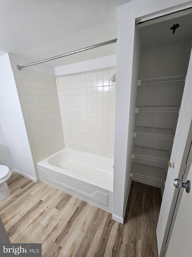 655 Absecon Blvd Unit 1002, Atlantic City, NJ 08401 - bathroom featuring wood finished floors and bathtub / shower combination