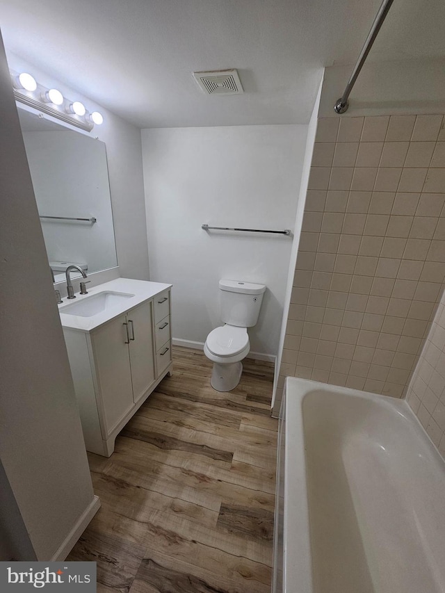 655 Absecon Blvd Unit 1002, Atlantic City, NJ 08401 - bathroom with vanity, wood finished floors, and shower / bath combination
