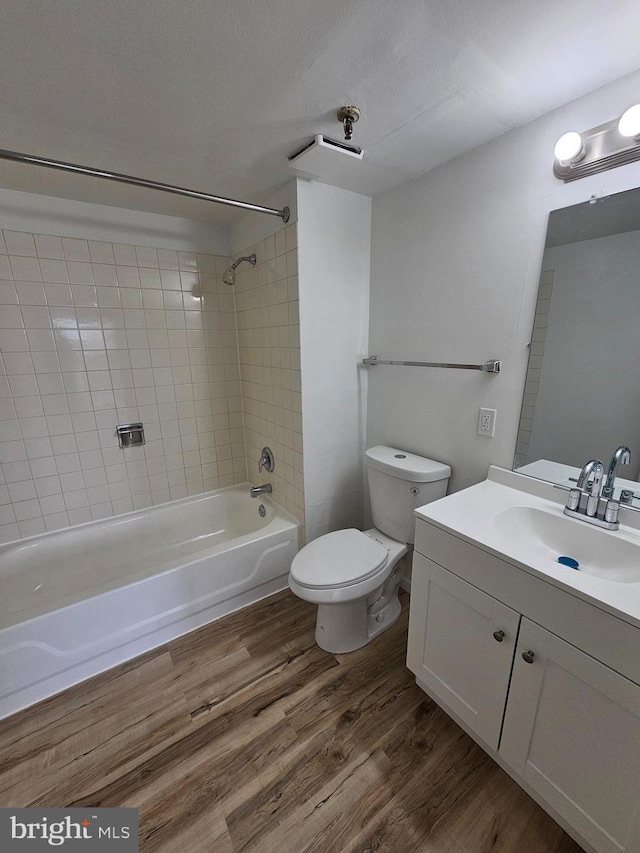 655 Absecon Blvd Unit 1002, Atlantic City, NJ 08401 - full bath with bathing tub / shower combination, vanity, and wood finished floors