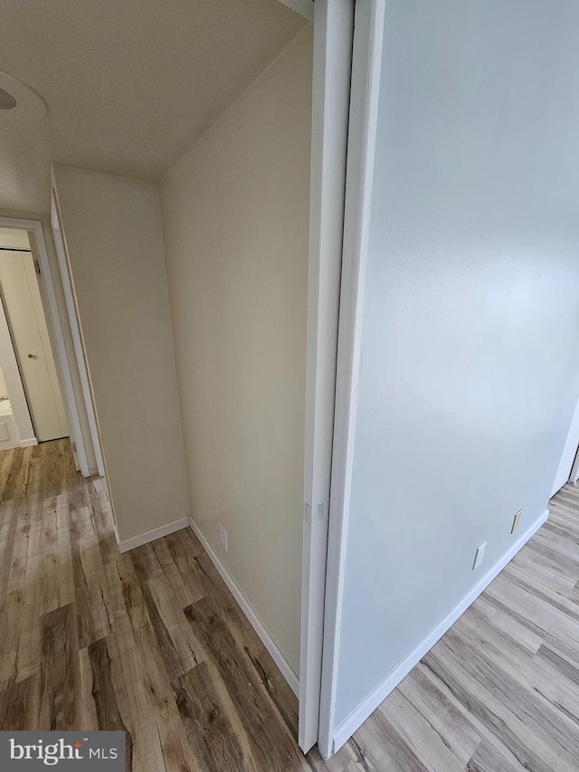 655 Absecon Blvd Unit 1002, Atlantic City, NJ 08401 - hallway with wood finished floors and baseboards