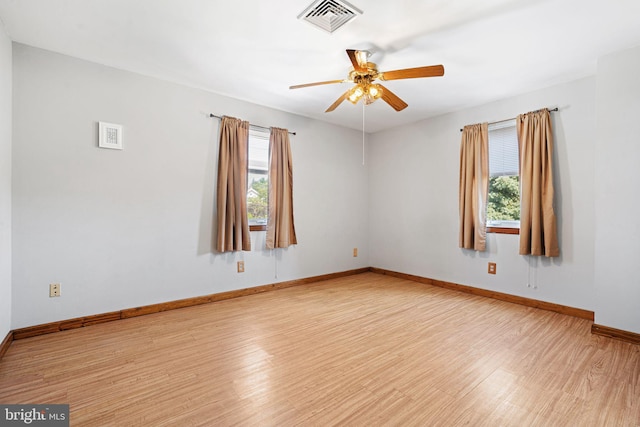 942 Paul St, Gloucester City, NJ 08030 - empty room with wood finished floors and ceiling fan