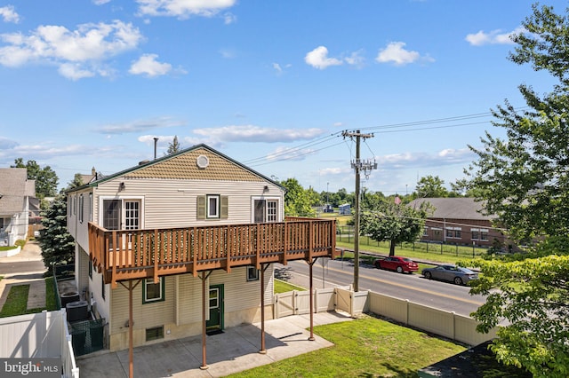 942 Paul St, Gloucester City, NJ 08030 - rear view of house with a deck and a patio area