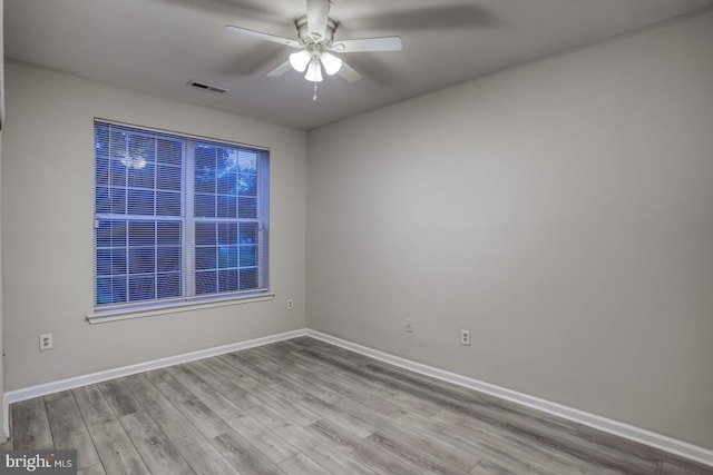 2902 Waters Edge Dr Unit 261, Newark, DE 19702 - unfurnished room with ceiling fan and wood finished floors