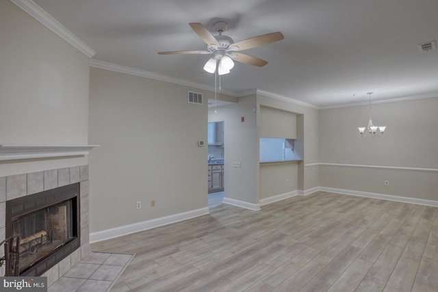 2902 Waters Edge Dr Unit 261, Newark, DE 19702 - unfurnished living room with ornamental molding, ceiling fan, light wood-style flooring, a chandelier, and a fireplace