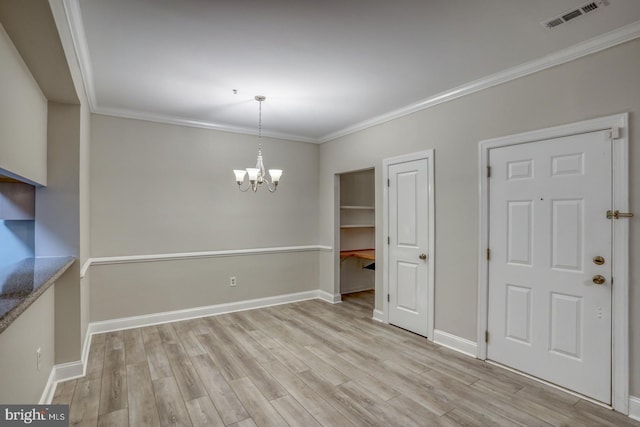 2902 Waters Edge Dr Unit 261, Newark, DE 19702 - unfurnished dining area with light wood-style flooring, a chandelier, and crown molding