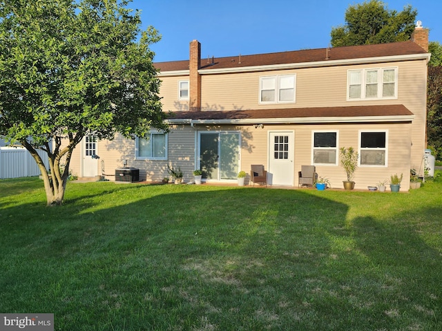 32 Devonshire Dr, Reading, PA 19610 - rear view of property featuring a chimney