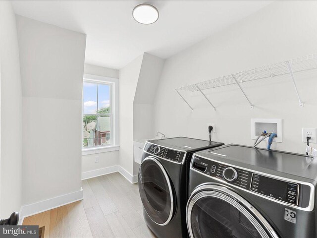 738 S Matlack St, West Chester, PA 19382 - laundry area featuring washer and clothes dryer and light wood-style floors