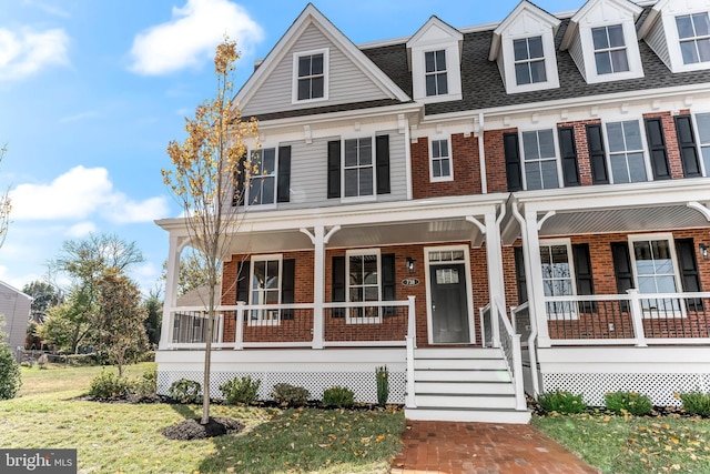 738 S Matlack St, West Chester, PA 19382 - view of front of home featuring brick siding, covered porch, a front lawn, and roof with shingles