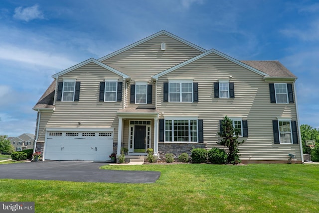 3017 Bainbridge Dr, Lansdale, PA 19446 - view of front of property featuring asphalt driveway, a front yard, a garage, and stone siding