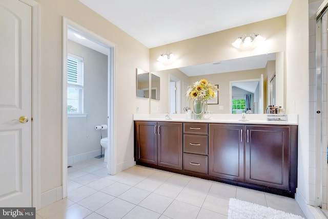 3017 Bainbridge Dr, Lansdale, PA 19446 - full bathroom with double vanity, plenty of natural light, and tile patterned flooring