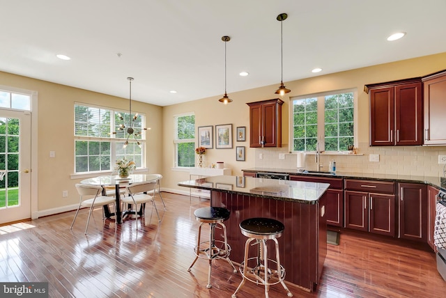 3017 Bainbridge Dr, Lansdale, PA 19446 - kitchen with plenty of natural light, a center island, light wood-style floors, dark stone counters, and recessed lighting