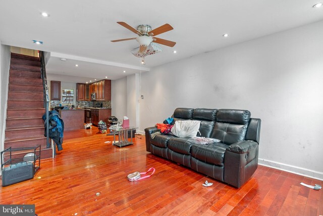 1847 Gerritt St, Philadelphia, PA 19146 - living area with ceiling fan, stairs, wood finished floors, and recessed lighting